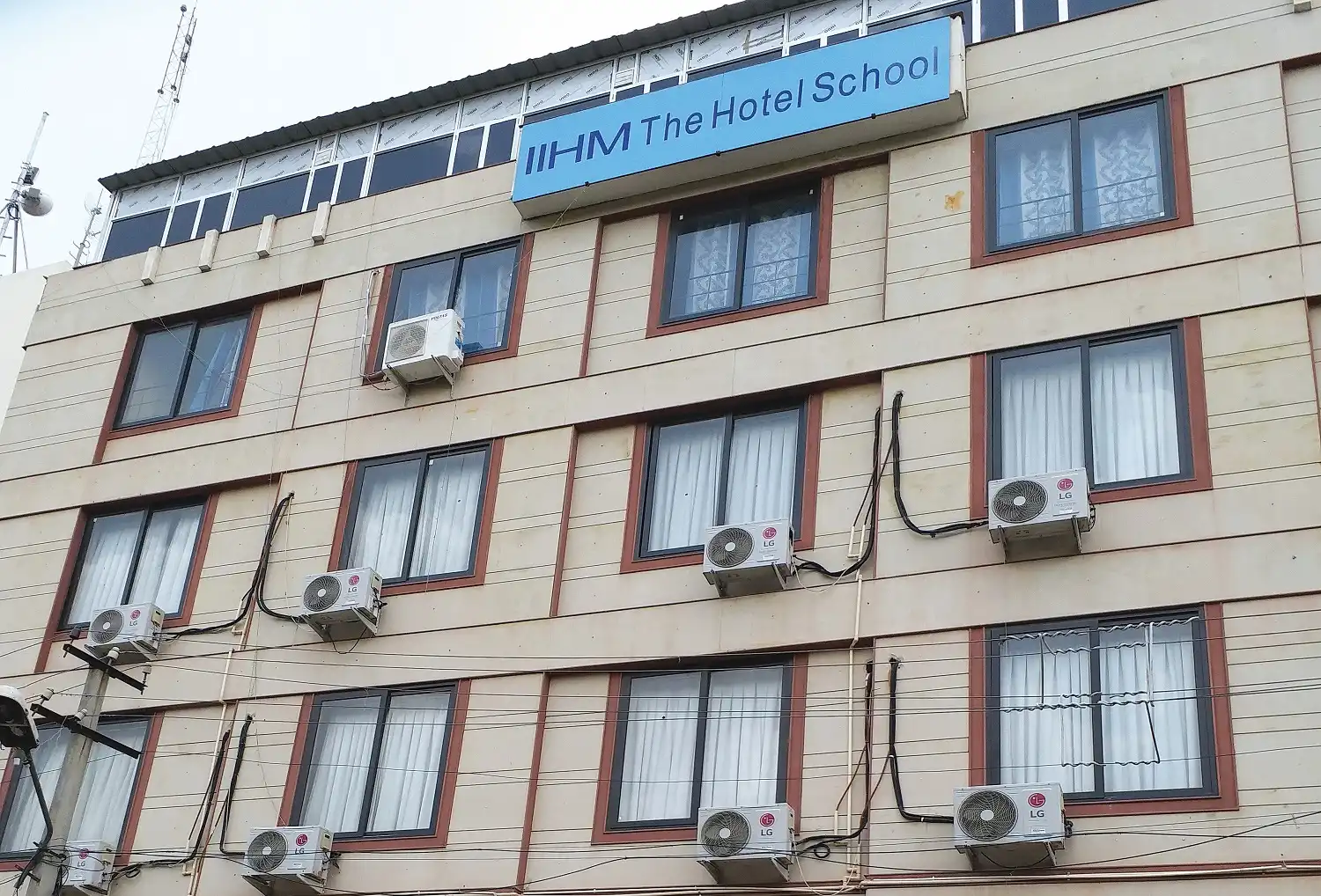 IIHM Jaipur campus building exterior, a top hotel management institute offering global career pathways in hospitality education.