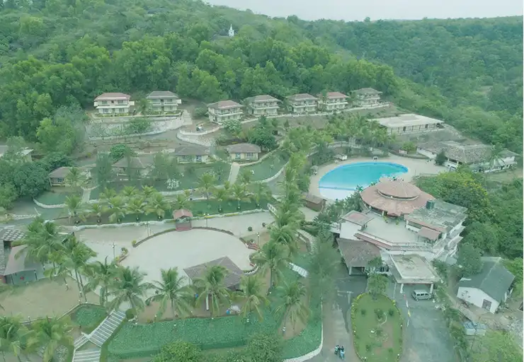 Aerial view of IIHM Goa campus with resort-style infrastructure, a top hotel management college in a scenic hospitality setting.